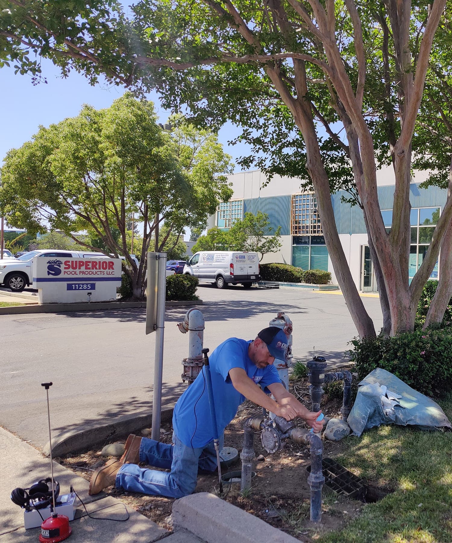 American Leak Detection technician testing a municipal water line.